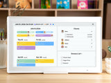 Everblog Digital Calendar Stand displaying daily schedule, chores, and grocery list.